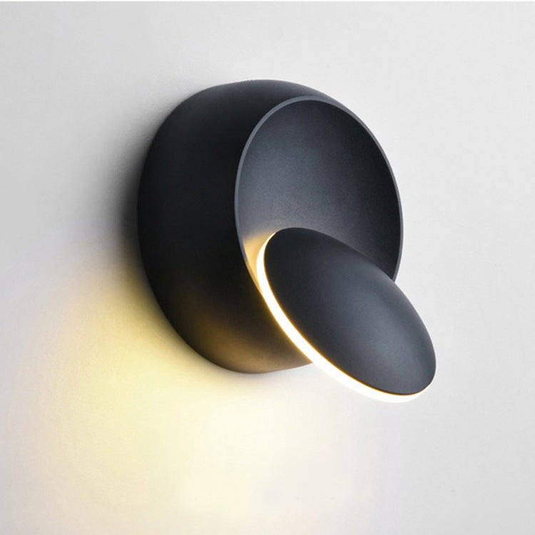Avelena | Zeitgenössische nordische Eisenrunde Eclipse drehbare LED Wandleuchte für Nachttisch