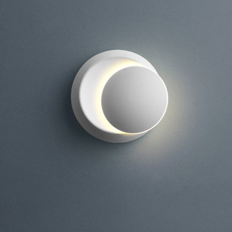 Avelena | Zeitgenössische nordische Eisenrunde Eclipse drehbare LED Wandleuchte für Nachttisch