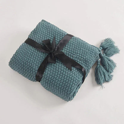 Avelena | Gestrickte Wolldecke mit Quasten - NordicCozy