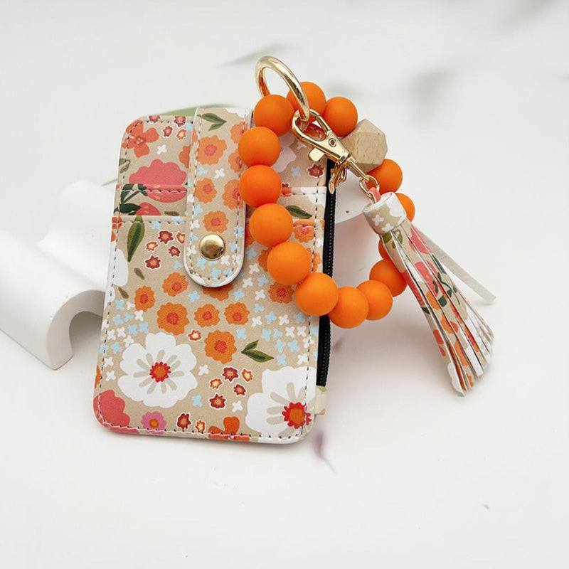 Avelena | Boho-Stil Perlen & Tassle Dekorierter Schlüsselanhänger mit Blumenmuster Geldbörse
