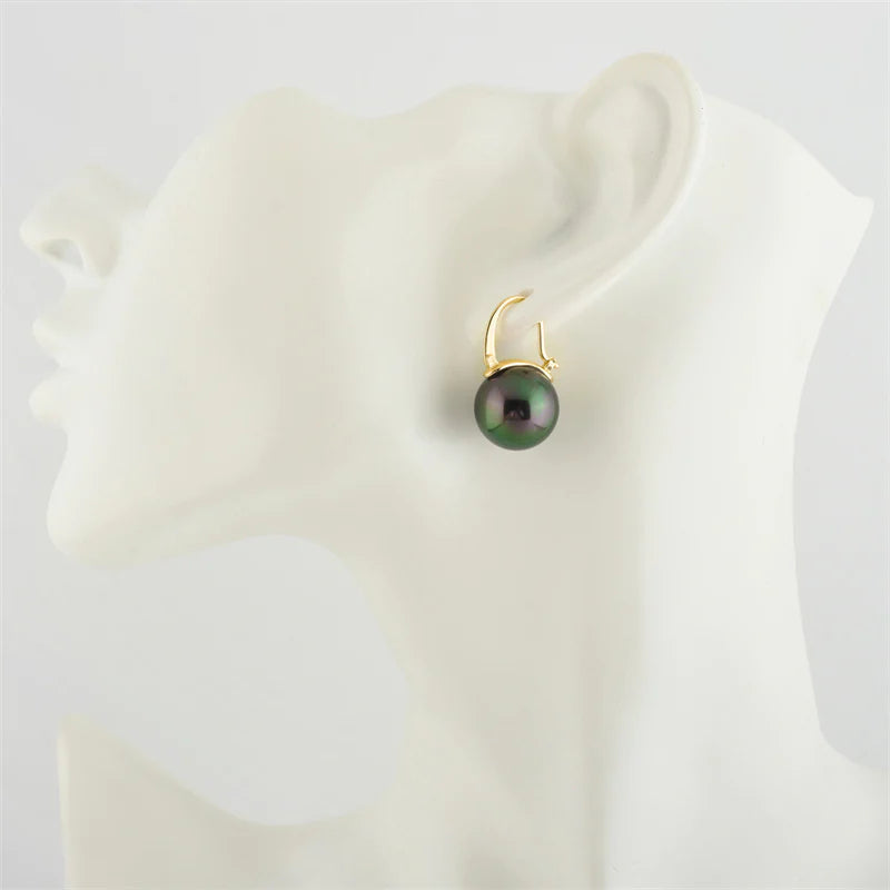 Avelena | Black pearl earrings Available in white champagne gray gold and black pearl dangling earrings