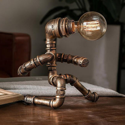 Avelena | Industrielle Rohr Mann Nachtlampe 1 Kopf Schmiedeeisen Tischlicht In Messing für Jungenzimmer