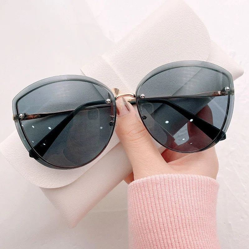 Avelena | Stylische ovale randlose Sonnenbrille