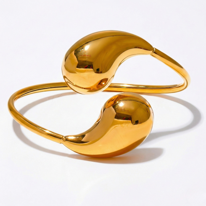 Damen Gedrehter Armreif mit Kugelenden in Offener Form Goldfarben | Shop Nory