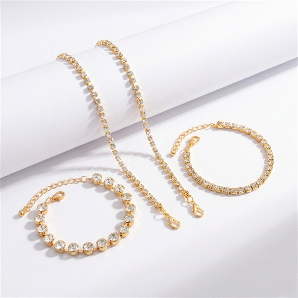 Damen Tennisarmband mit Strasssteinen in Goldoptik | Shop Nory