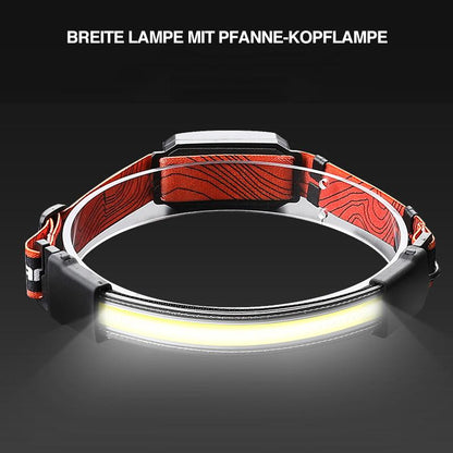 Avelena | Scheinwerfer mit roten Warnleuchten bei Nacht