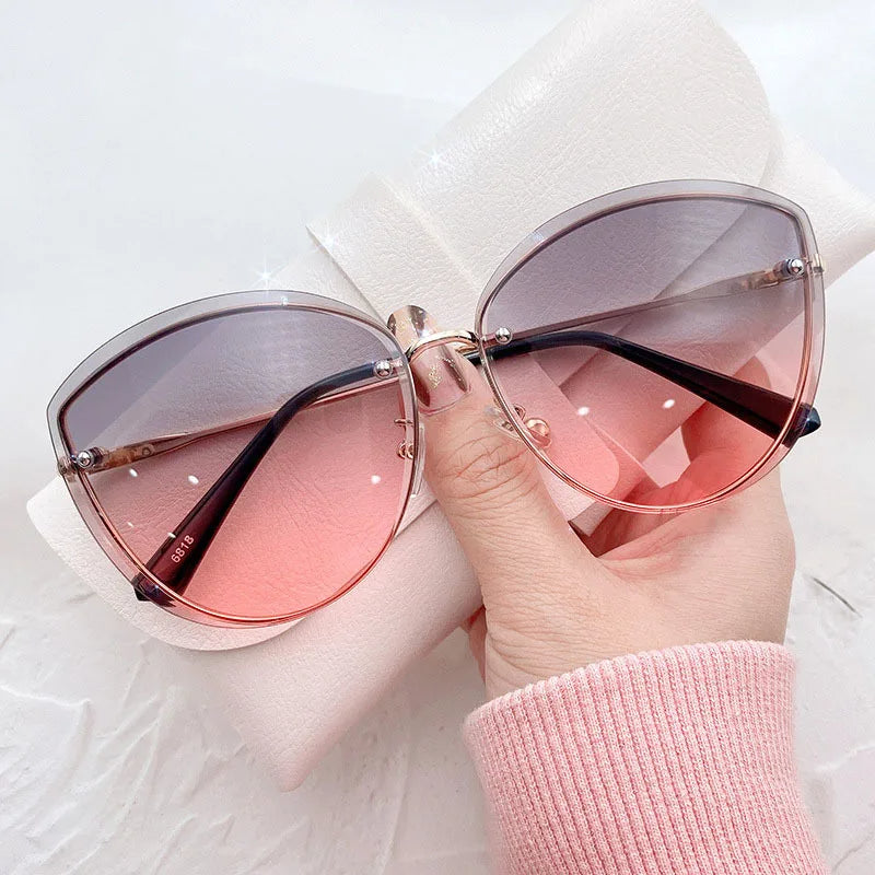 Avelena | Stylische ovale randlose Sonnenbrille