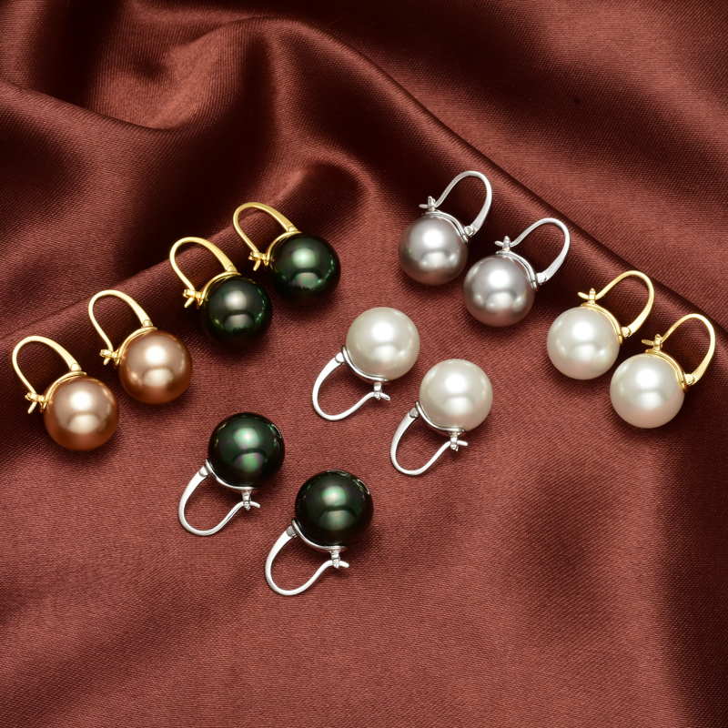 Avelena | Black pearl earrings Available in white champagne gray gold and black pearl dangling earrings