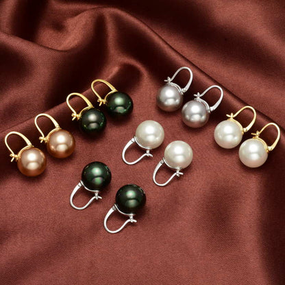 Avelena | Black pearl earrings Available in white champagne gray gold and black pearl dangling earrings