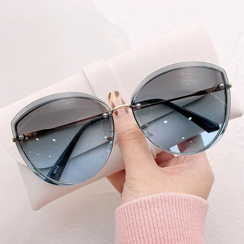 Avelena | Stylische ovale randlose Sonnenbrille