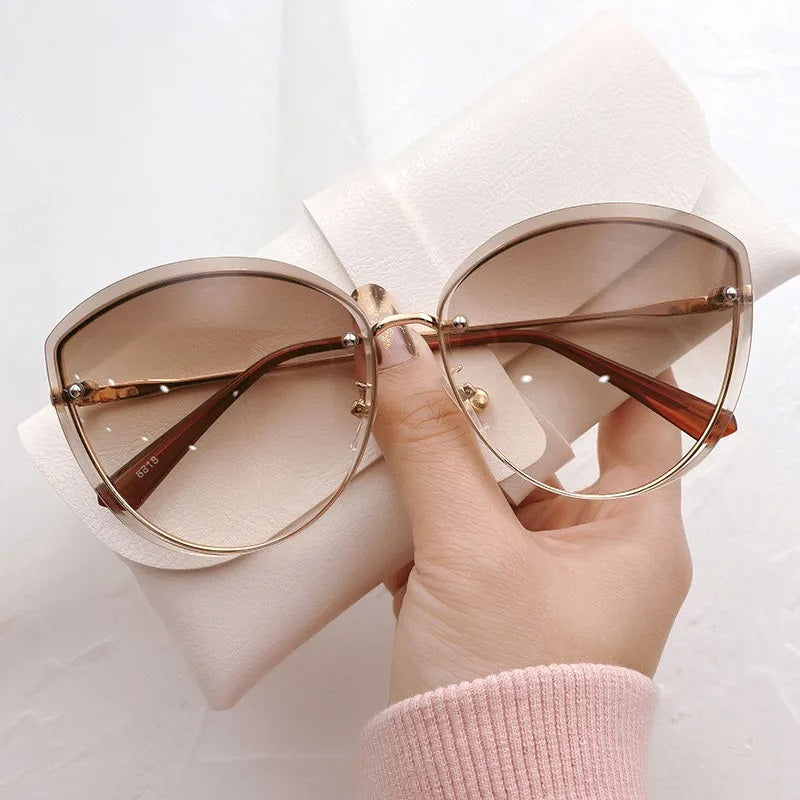 Avelena | Stylische ovale randlose Sonnenbrille