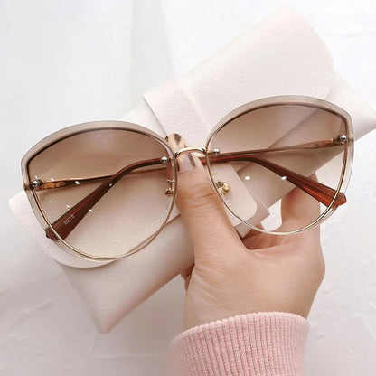 Avelena | Stylische ovale randlose Sonnenbrille