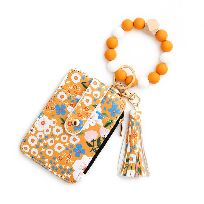 Avelena | Boho-Stil Perlen & Tassle Dekorierter Schlüsselanhänger mit Blumenmuster Geldbörse