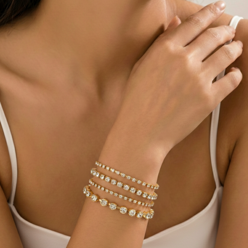 Damen Tennisarmband mit Strasssteinen in Goldoptik | Shop Nory