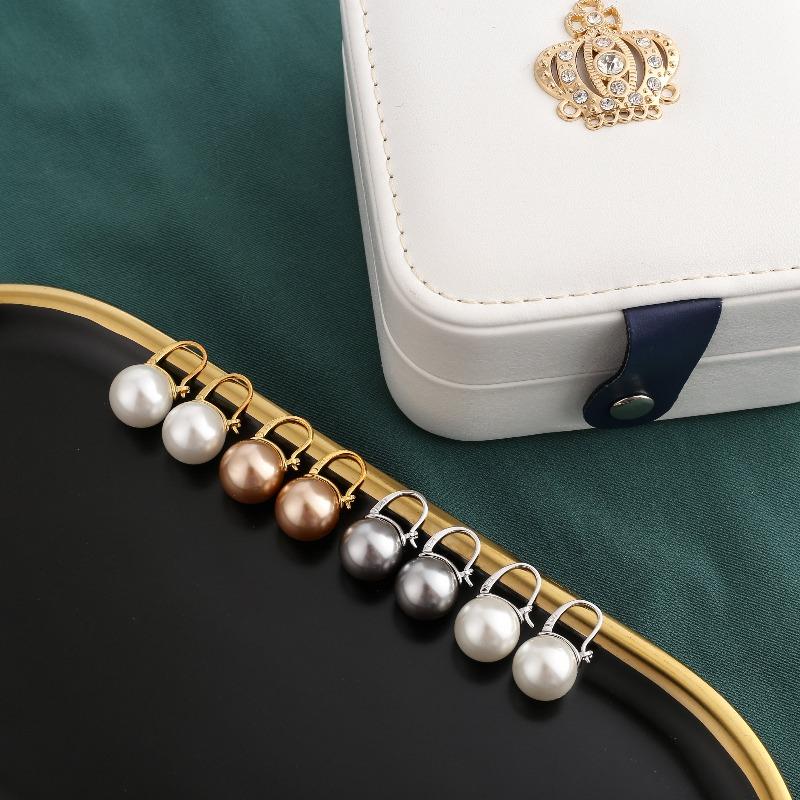 Avelena | Black pearl earrings Available in white champagne gray gold and black pearl dangling earrings