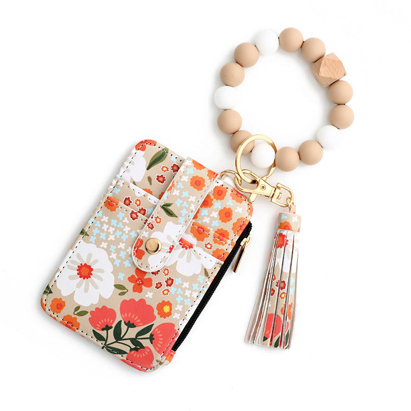Avelena | Boho-Stil Perlen & Tassle Dekorierter Schlüsselanhänger mit Blumenmuster Geldbörse