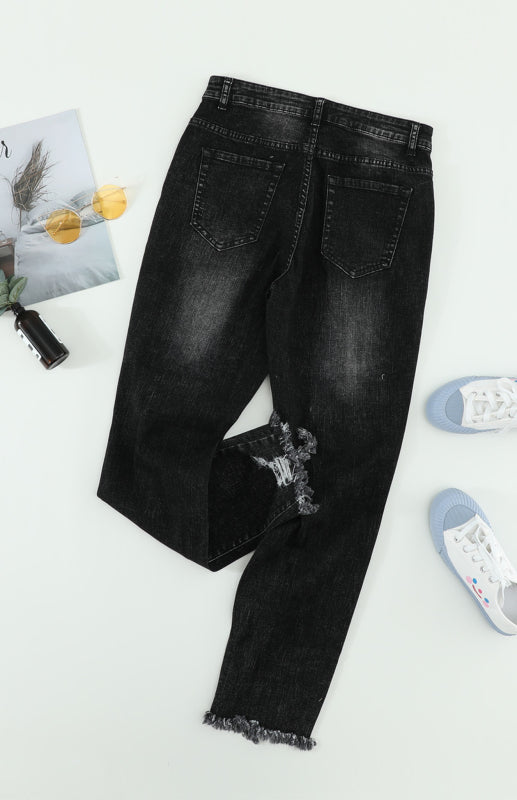 Klassische, verwaschene Slim-Fit-Jeans mit mittlerer Leibhöhe und Rissen