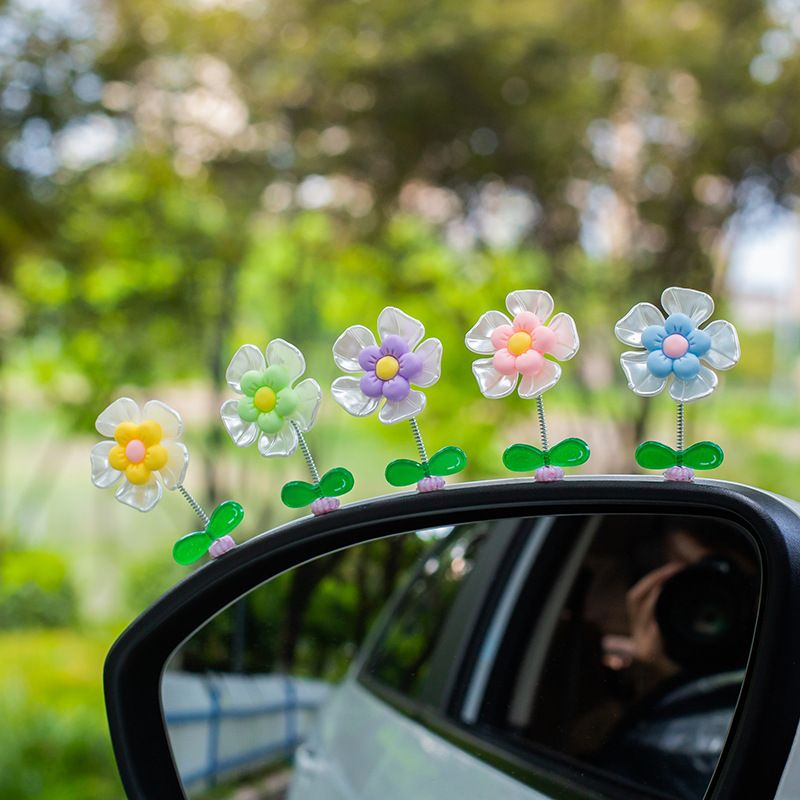 Avelena | Blumenornamente im Auto