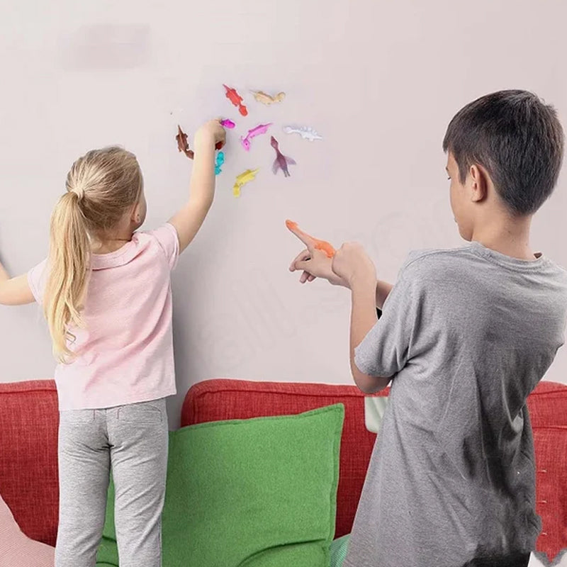 Avelena | Slingshot Dinosaurier Finger Spielzeuge (10-50 Stück)