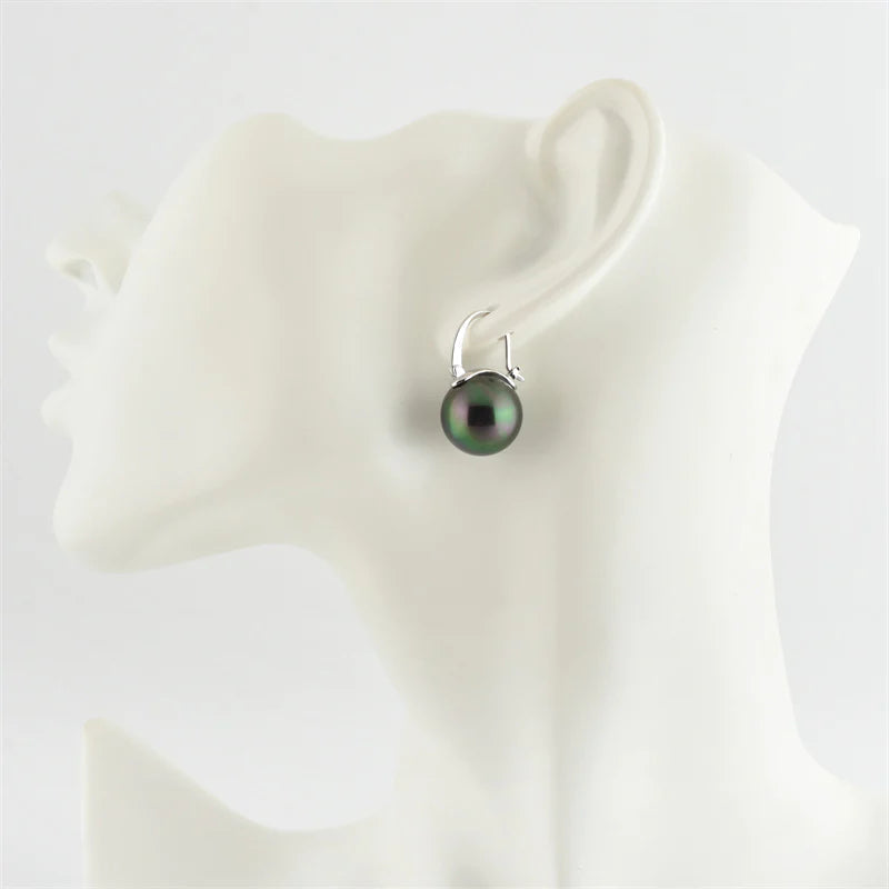 Avelena | Black pearl earrings Available in white champagne gray gold and black pearl dangling earrings