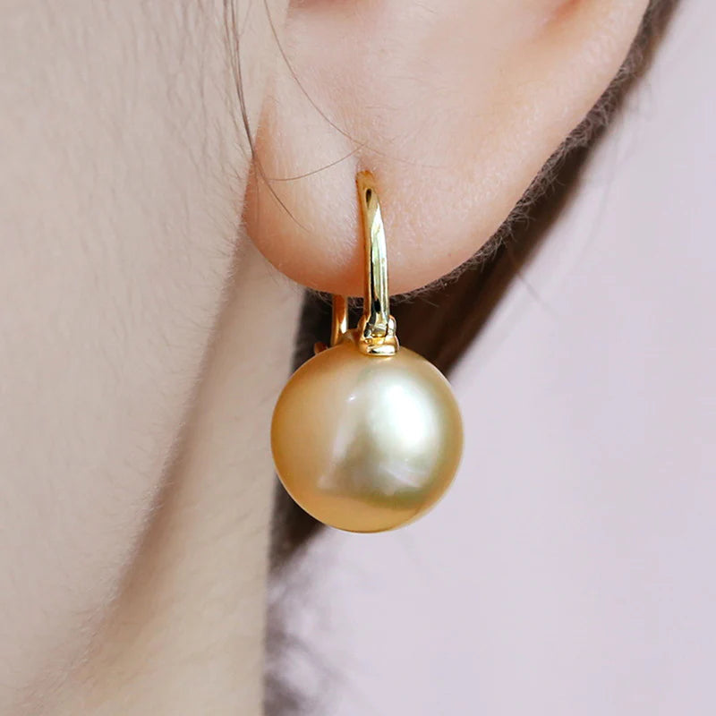 Avelena | Black pearl earrings Available in white champagne gray gold and black pearl dangling earrings