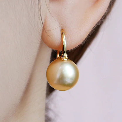 Avelena | Black pearl earrings Available in white champagne gray gold and black pearl dangling earrings