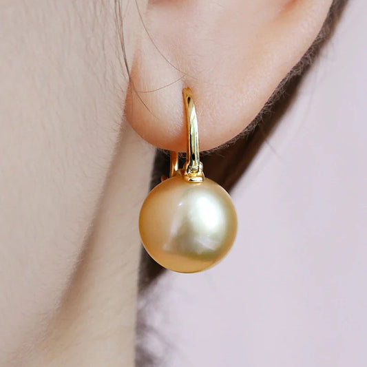 Avelena | Black pearl earrings Available in white champagne gray gold and black pearl dangling earrings