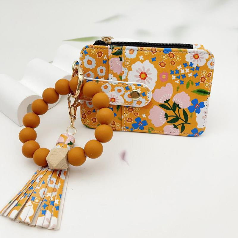 Avelena | Boho-Stil Perlen & Tassle Dekorierter Schlüsselanhänger mit Blumenmuster Geldbörse