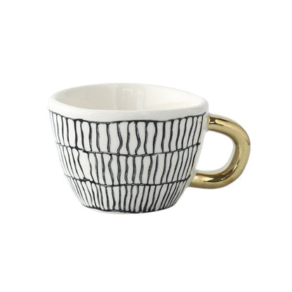 Avelena | Tasse mit abstraktem geometrischem Muster und goldenem Henkel