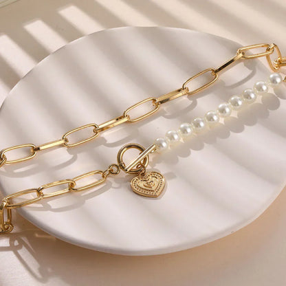 Avelena | Goldenes Herz Halskette mit Perlendetails Veerle