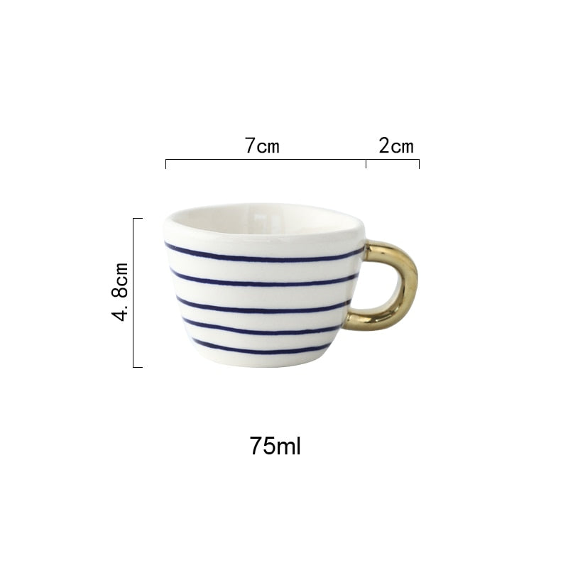 Avelena | Tasse mit abstraktem geometrischem Muster und goldenem Henkel