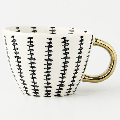 Avelena | Tasse mit abstraktem geometrischem Muster und goldenem Henkel