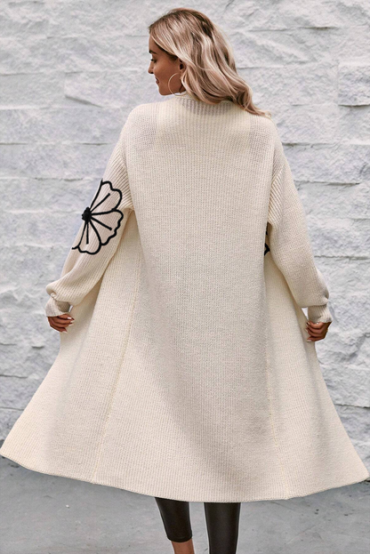 Avelena | Offene Schulterfreie Duster-Strickjacke mit Blumenstickerei
