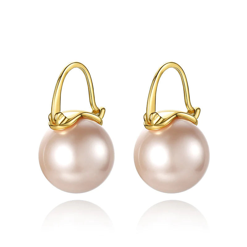 Avelena | Black pearl earrings Available in white champagne gray gold and black pearl dangling earrings