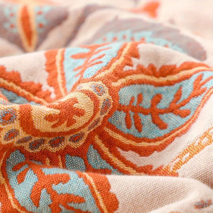 Avelena | Boho Floral Baumwoll-Wurfdecke mit Fransen – Creme & Orange