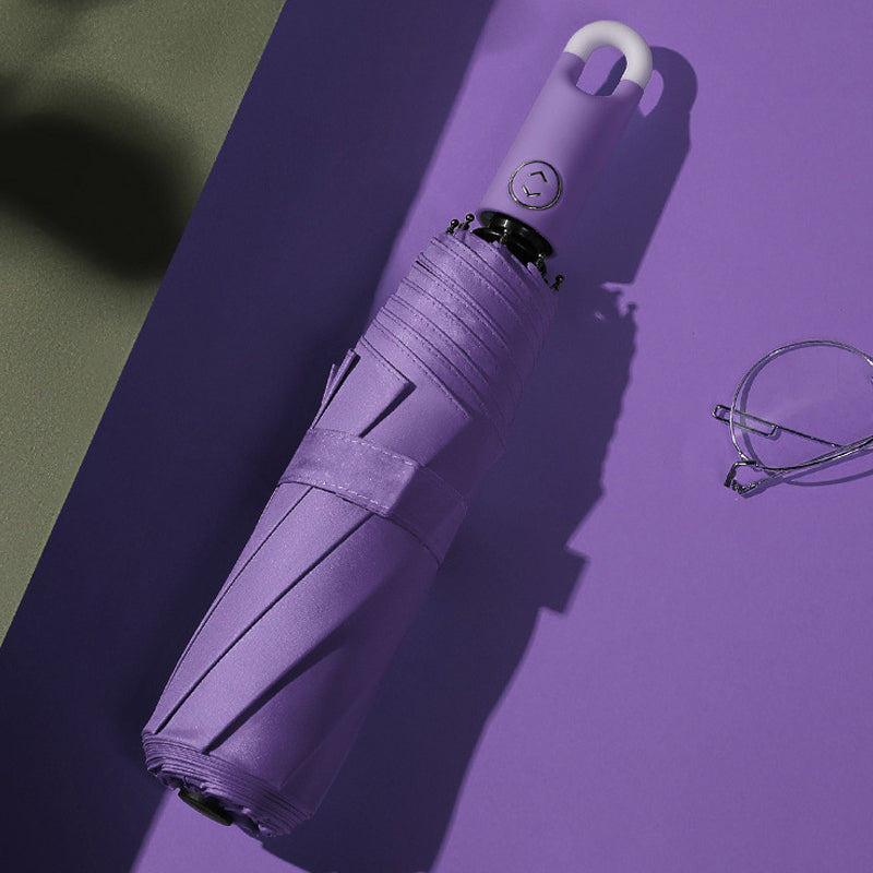 Avelena | Dreifach selbstöffnender und zurückziehbarer Regenschirm mit Schnalle