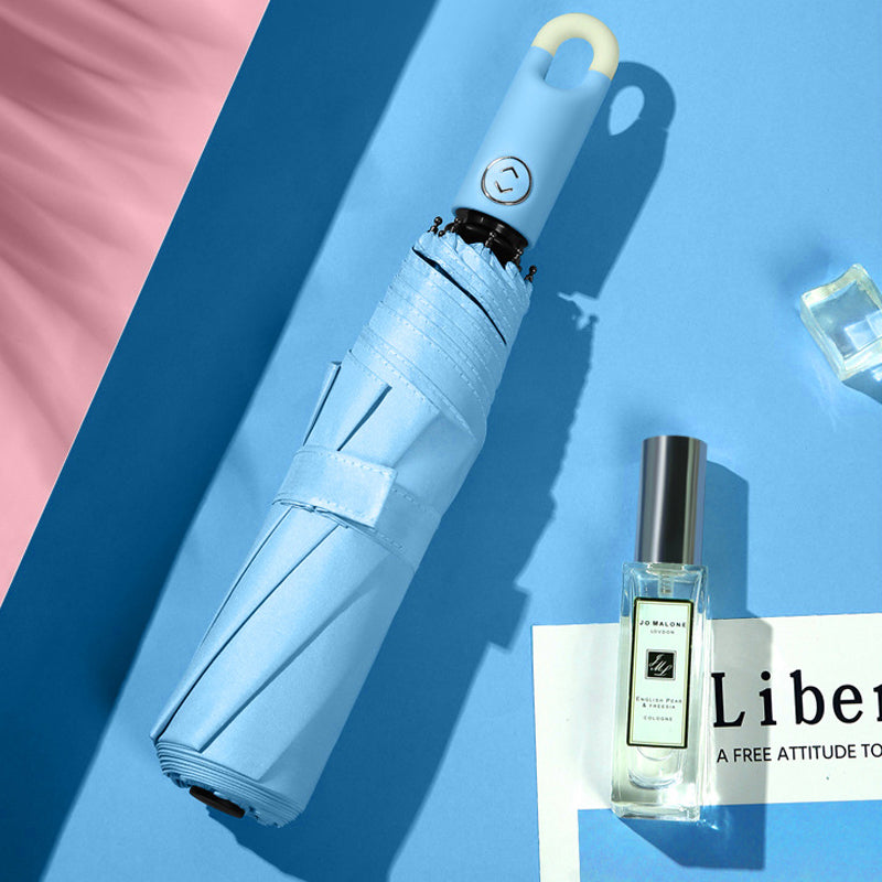 Avelena | Dreifach selbstöffnender und zurückziehbarer Regenschirm mit Schnalle