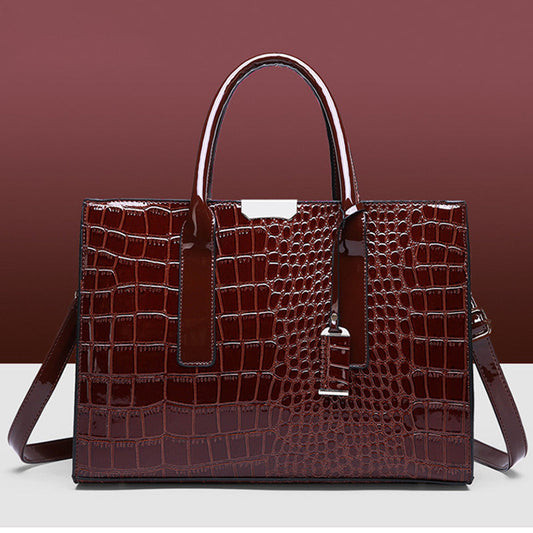Avelena | Tasche mit Krokodilprägung.
